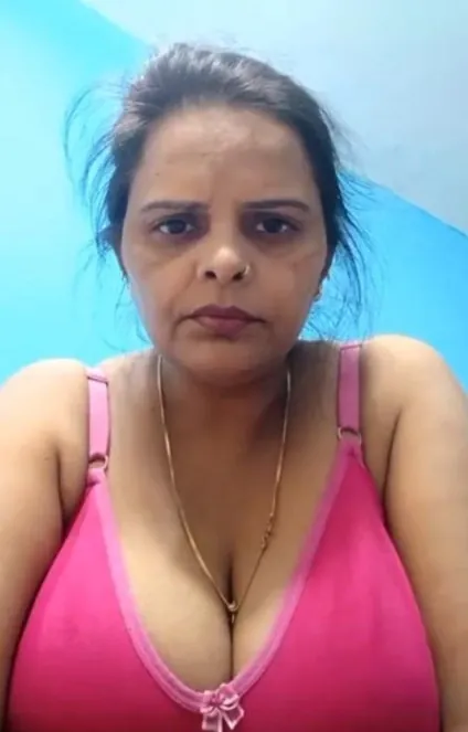 Desi Wife Hanging Her Big Boobs Out of Pink Bra and Pressing Them Hard