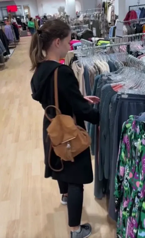 Hot Babe Strips Nude in Public Store Showing Her Boobs and Ass in Changing Room