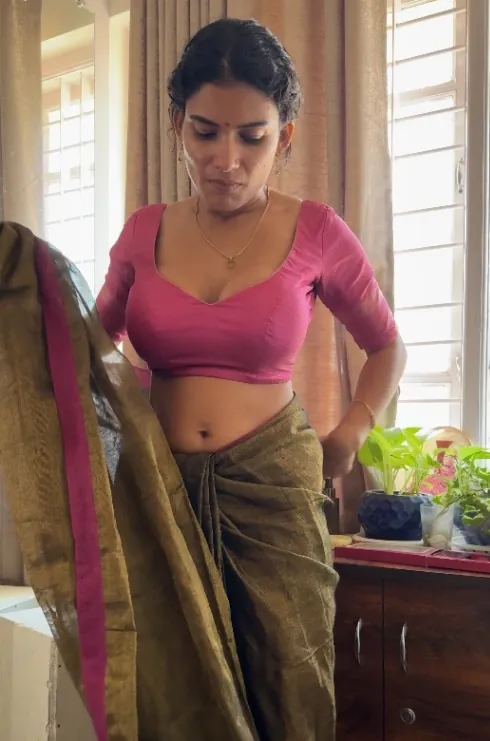 Mallu Milf Model Resmi Nair Stripping Out of Her Saree to Show Her Huge Boobs and Pussy