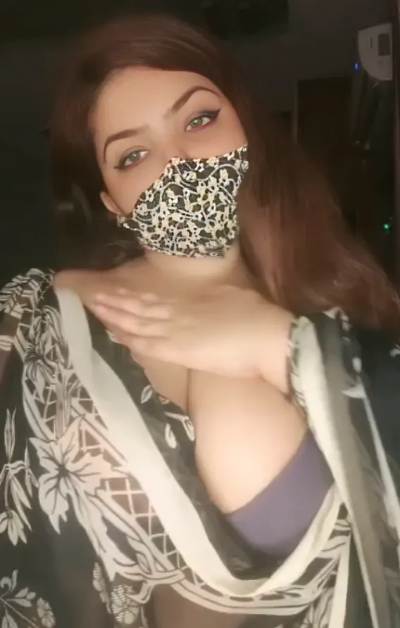 Sexy Indian Wife in Saree Teasing Her Big Boobs with Deep Cleavage