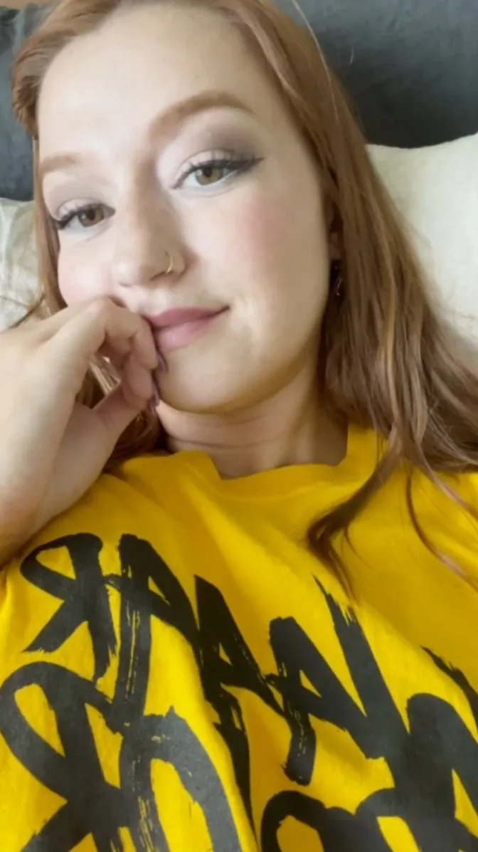 Cute babe strips fully nude on bed and rubs her wet pussy hard